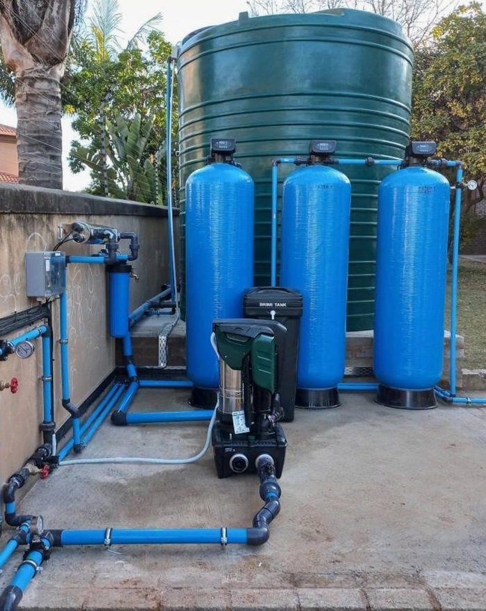 Large blue filtration vessels and neat piping